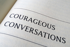 A page on which is printed a chapter title heading that reads 'Courageous Conversations'