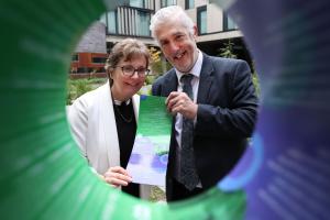 QQI Chair, Professor Irene Sheridan and QQI CEO, Dr Padraig Walsh holding a copy of the new QQI statement of strategy 2025-7